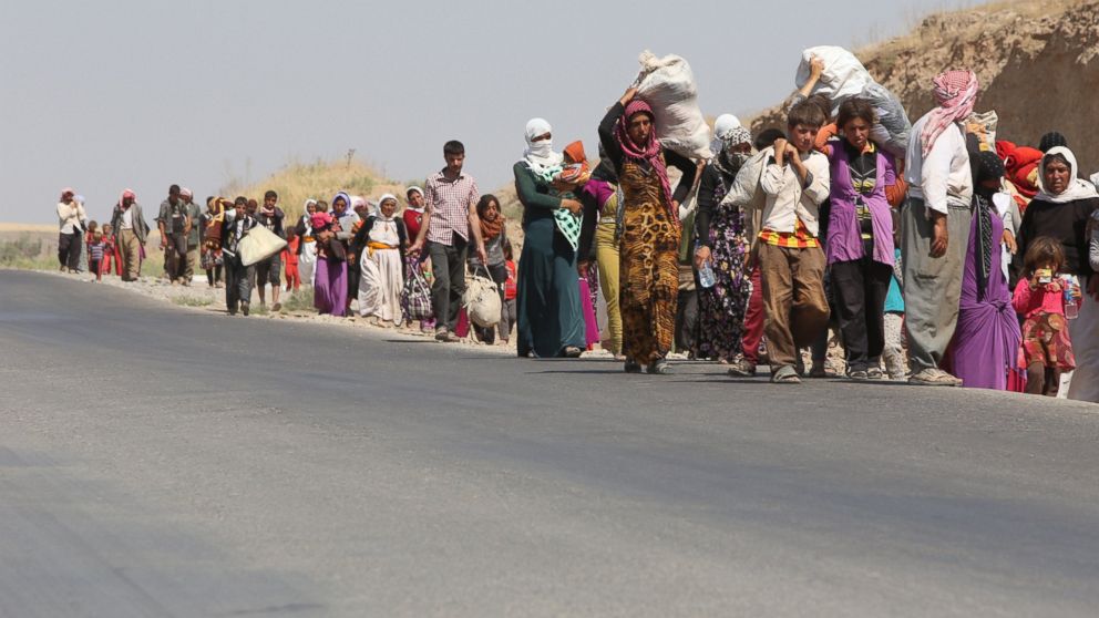 yazidis fleeing so-called "IS" atrocities