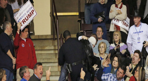 Silently Protesting Muslim Woman Ejected from Donald Trump Rally