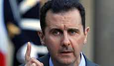 Assad Vows Victorious Battle for Syria, Keeps Calm Image in Face of Threats 