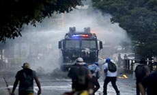Riot Police, Protesters Clash in Venezuela