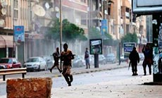 Extremists Seize Key Benghazi Army Base as Tripoli Fire Rages