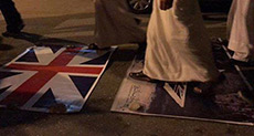 Bahrainis Protest against UK PM’s Visit, Burn British Flag