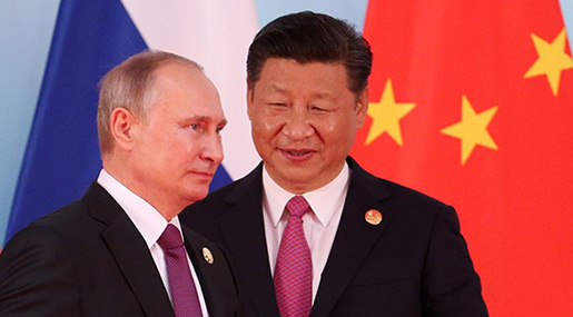 China Hosts Russia, Iran for Summit as US Tensions Rise