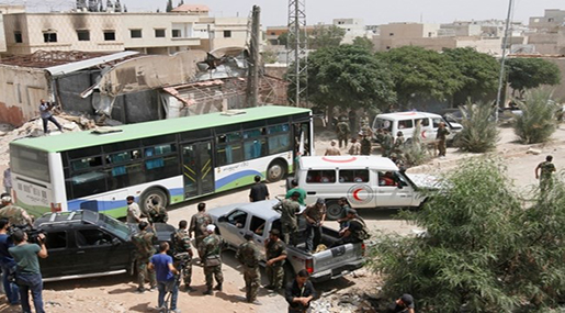 Syrian buses transport militants and their families to Idlib 