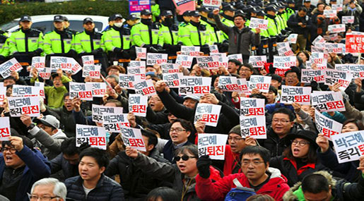 S Koreans Hold Mass Protests Demanding President Ouster, Arrest