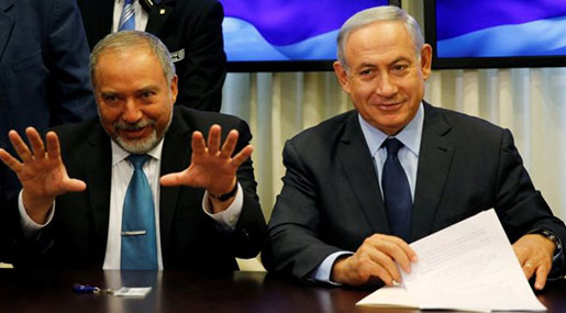 "Israeli" PM Benjamin Netanyahu and appointed War Minister Avigdor Liberman 