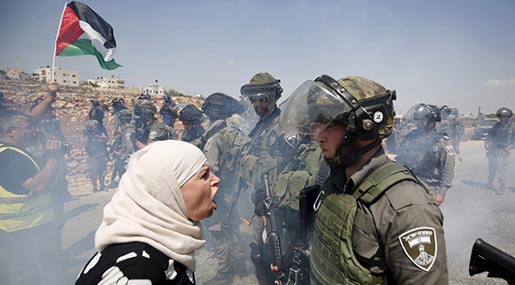 Palestinian woman and "Israeli" police