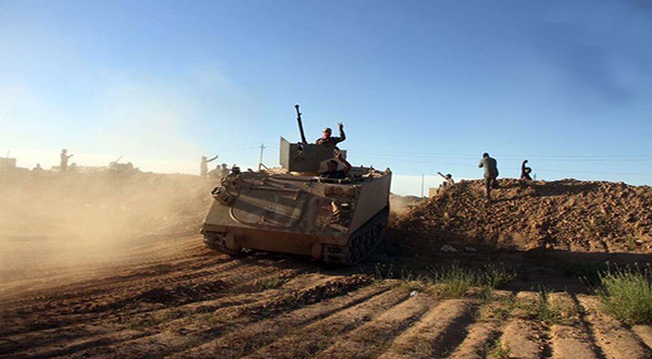 PMU forces reach Syrian border 