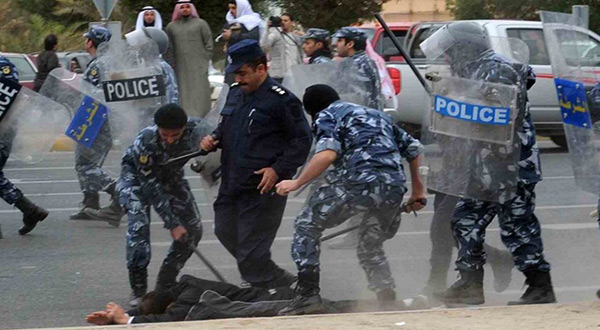 Gulf police hitting protester 
