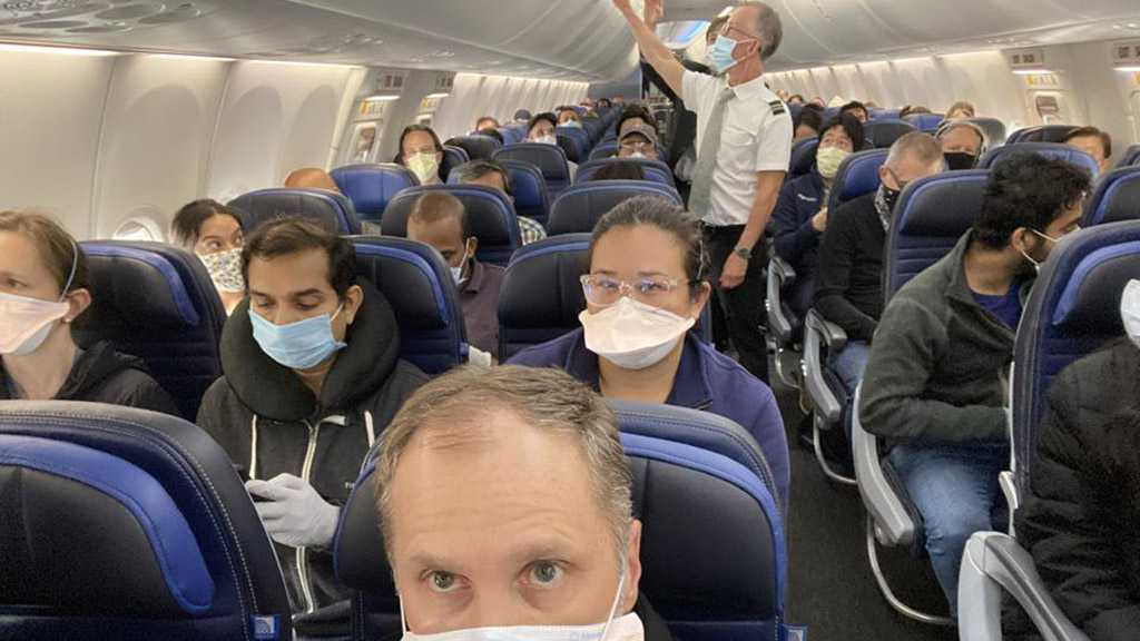 Canada Slaps First Fines on Plane Travelers without Masks