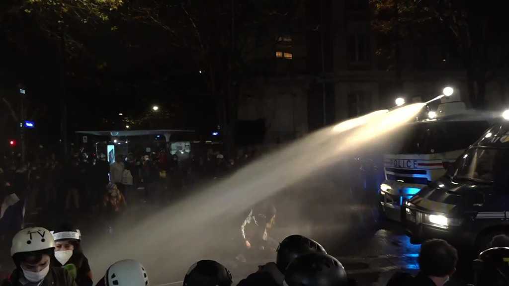 French Police Use Water Cannons against Anti-Global Security Bill Protesters in Paris
