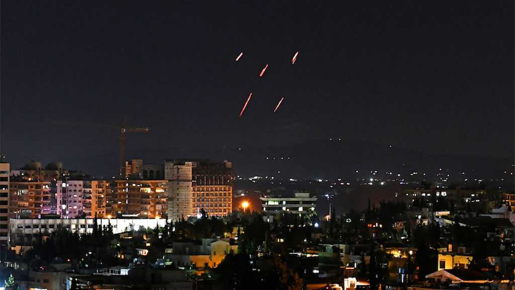 Syrian Air Defenses Confront ‘Israeli’ Missile Attack on Damascus, Soldier Martyred