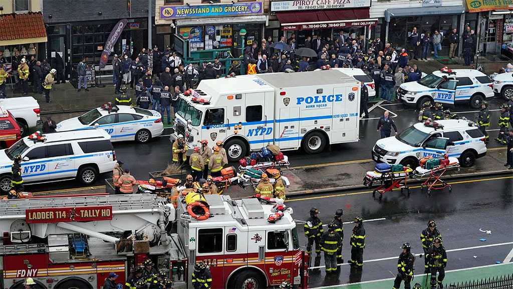 NY Subway Shooting: Police Hunt for Suspect Who Left More than 20 Injured