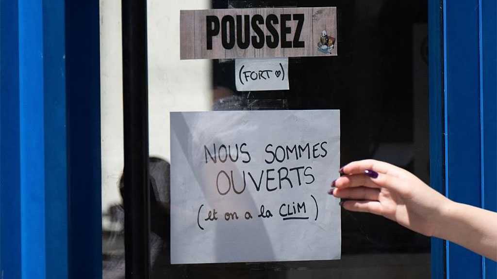 France Orders Air-conditioned Shops to Save Energy by Shutting Doors