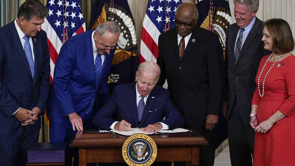 Biden Signs Expansive Climate Change, Health Care Bill into Law