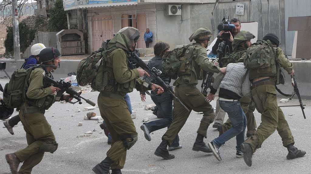 ‘Israeli’ Occupation Forces Kidnap 14 Palestinians In the West Bank