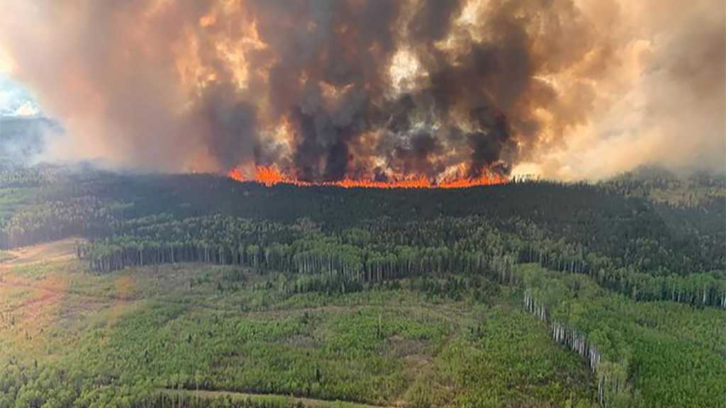 Wildfires Prompt Hazy Skies, Air Quality Warnings in Canada, US