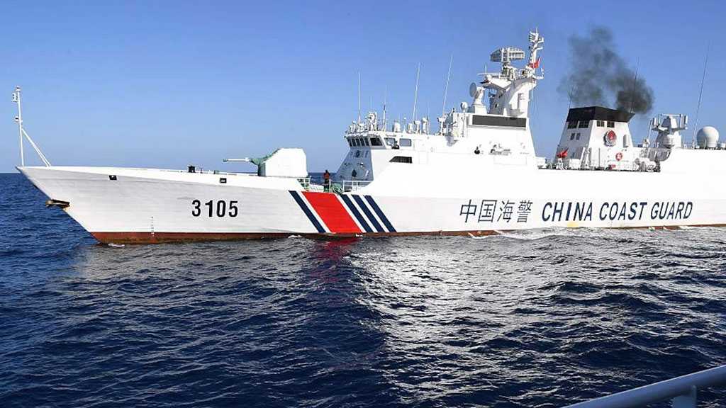 China Vows to Crush Foreign Incursions in South China Sea