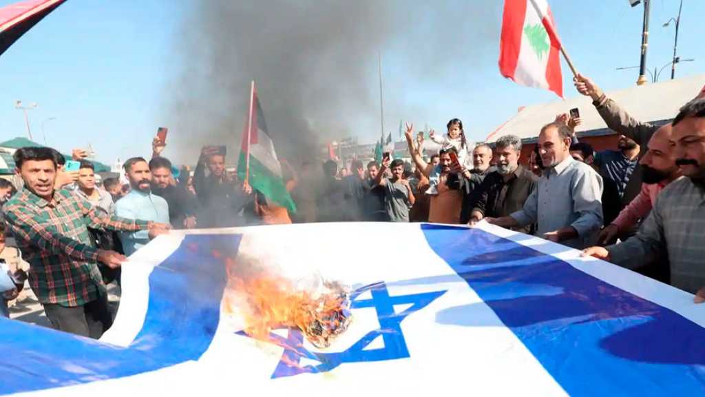 Iraqi Protesters Rally against “Israeli” Aggression, Burn Flags of US, UK, and ’Israel’