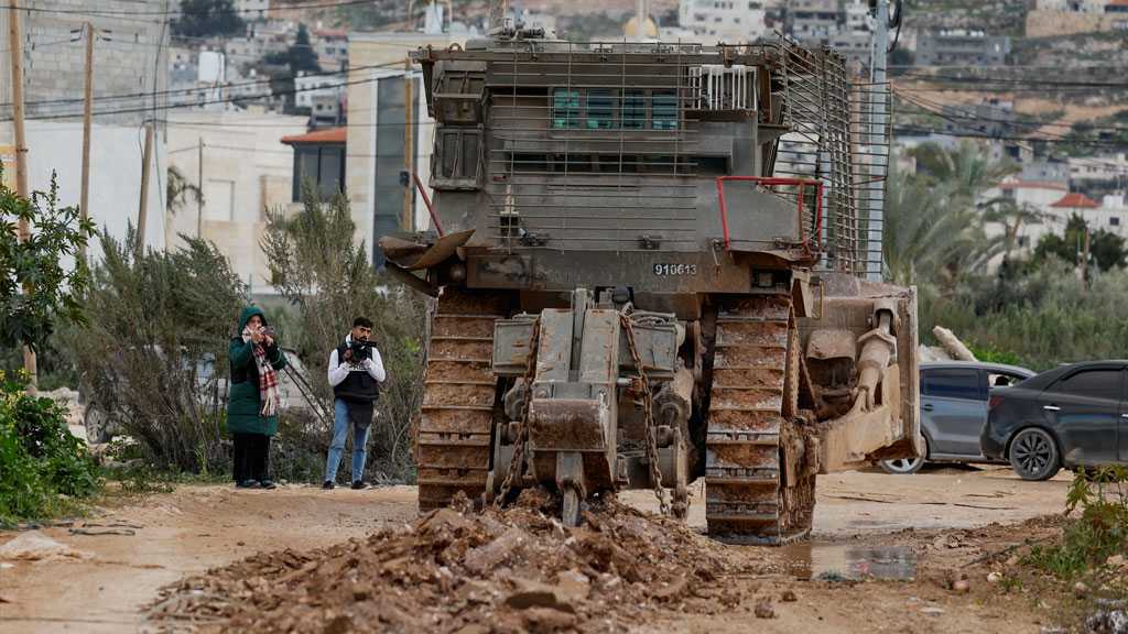 “Israel” Intensifies West Bank Raids Amid Warnings of Ongoing Genocide